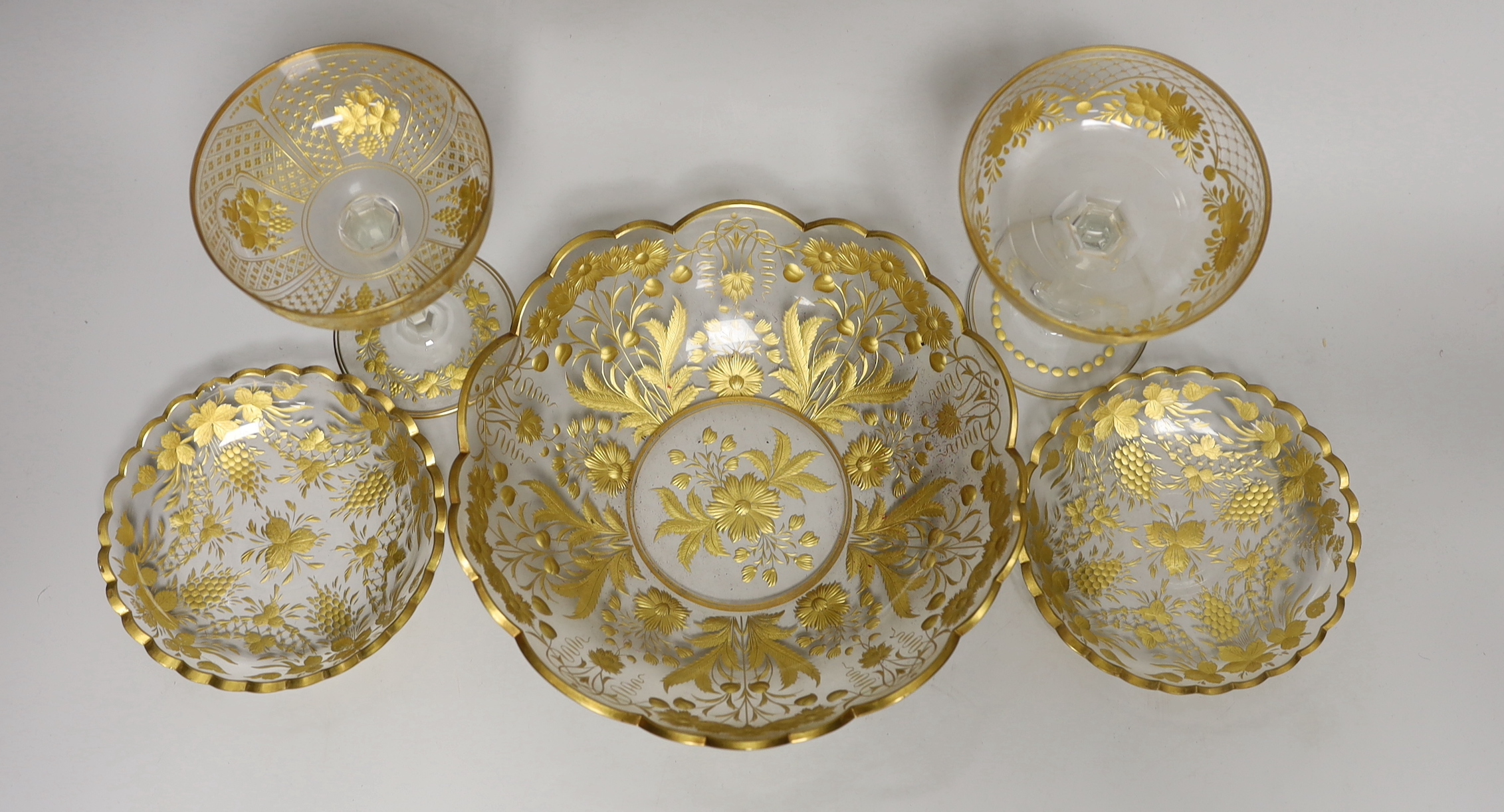 A group of gilded wheel engraved Bohemian table glass